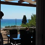Porto Assini Tolo