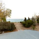 Porto Assini * Tolo